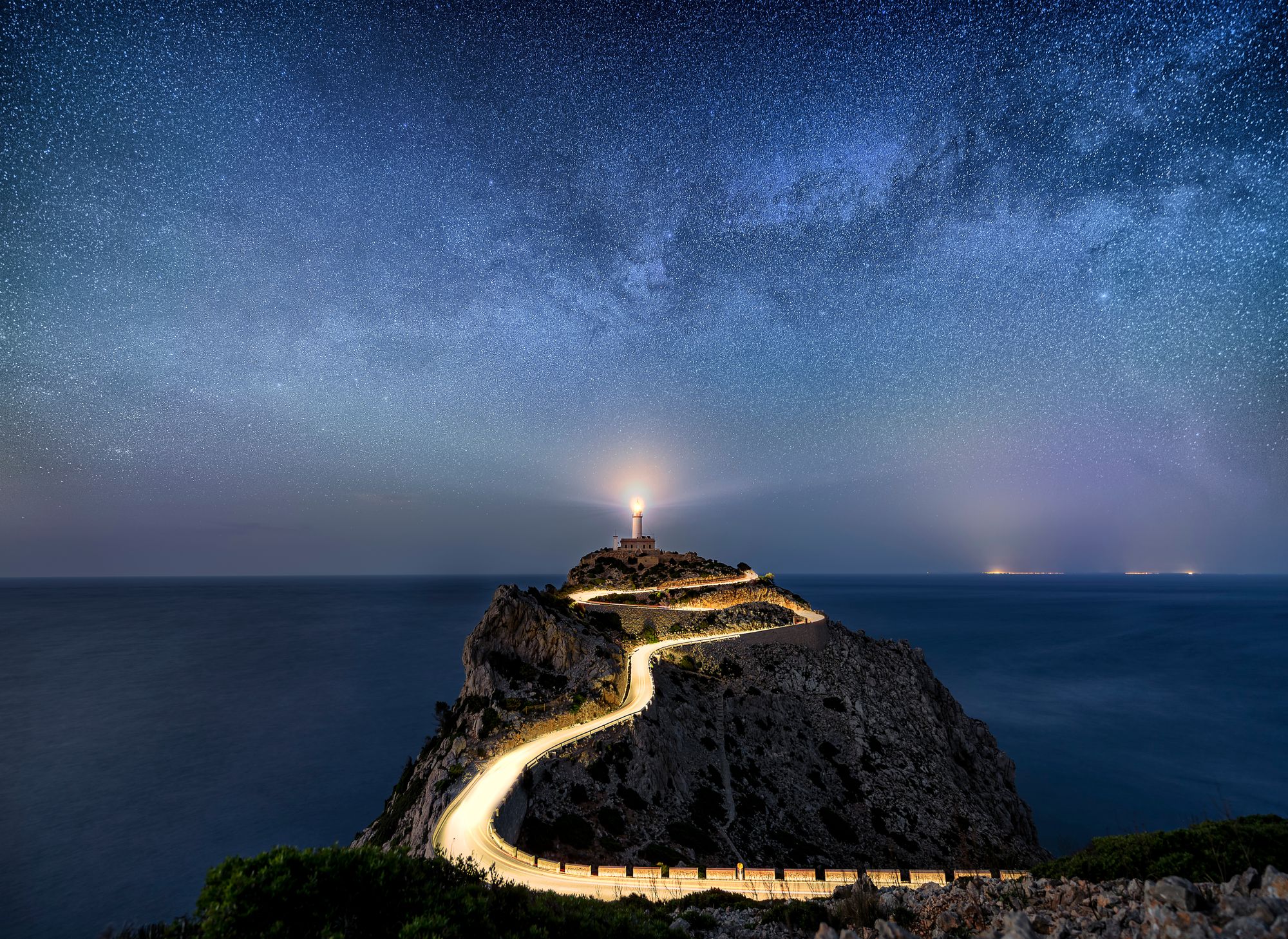 Lighthouse with an illuminated path.